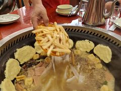 -哈尔滨东北铁锅炖(都督街店)