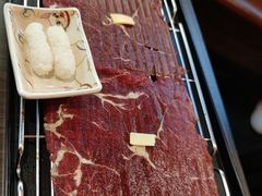 铺天盖地火牛寿司（2枚）-仙隐小鹿中華の日料(荣民龙首广场店)