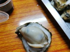 -蚝哥花姐湛江烤生蚝(美丽湾市场店)