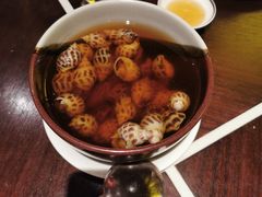 古越陈酿煮花螺-杭州西子湖四季酒店·金沙厅