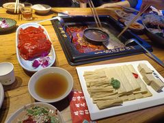 -老牌坊云南鱼豆花火锅(哈西万达店)