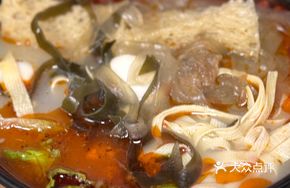 Spicy Hot Pot Noodles with Hand-Sliced Noodles