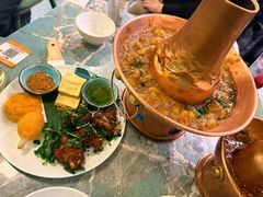 土司铜锅油焖鸡-浩海火烧云傣家菜(京广店)