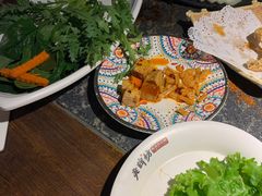 -老牌坊云南鱼豆花火锅(哈西万达店)