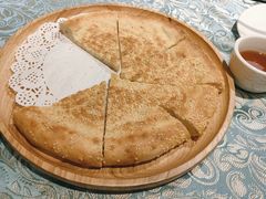 馕坑芝麻馕-巴扎美食·新疆菜·西域歌舞表演餐厅(新疆大厦店)