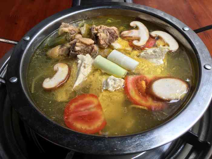 彝家豆花鸡火锅-"绿地联盛9栋1楼的门面小店,彝族豆花鸡火.