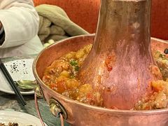 土司铜锅油焖鸡-浩海火烧云傣家菜(京广店)