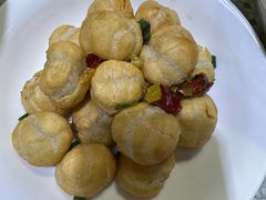 酸菜炒汤团-蜗牛小馆醉乡民谣云南菜(惠新西里店)