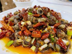炒田螺-渝君重庆火锅(嘉宾路店)