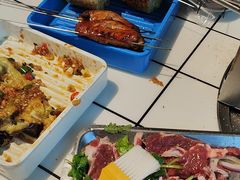 -喜悦小串丹东小黄牛海鲜烧烤大排档(民主广场店)