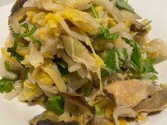 脆酸菜炝拌香螺-东方饺子王(新奥购物中心店)