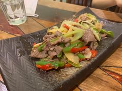 酸木瓜炒牛肉-紫滇源云南生态菜(丹凤街店)