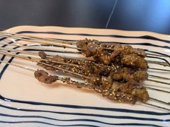 炭烤牛肉小串-许哥东北烧烤·铁丳烤串·宫后夹肉(繁花中心店)
