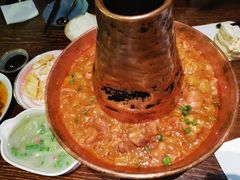 土司铜锅油焖鸡-浩海火烧云傣家菜(京广店)
