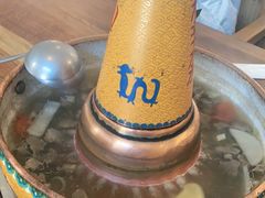 -毛辣果·贵州红酸汤牛肉火锅(西单店)