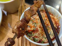 -明何记涮牛肚(品牌首店隋唐植物园南门古城路店)