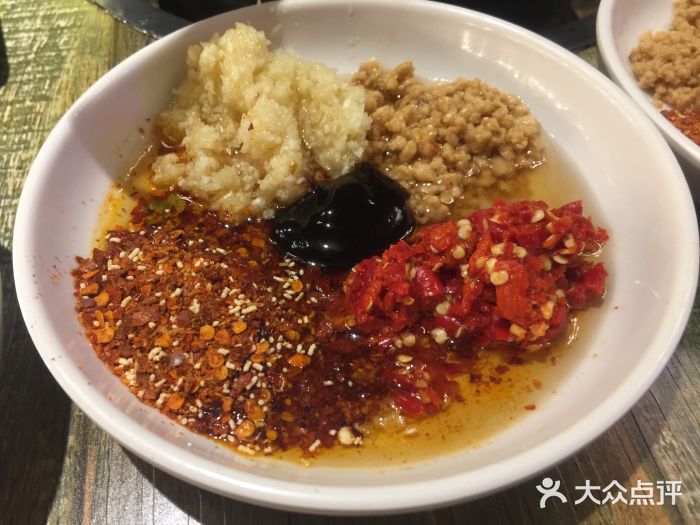 老北京·羊蝎子火锅(王家湾店)油碟图片