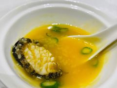 明炉小米煨鲍鱼-臻宝中餐厅·大连菜·海鲜·融合菜(大连一方城堡豪华精选酒店)