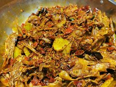 爆辣干锅鸭头-安诚居干锅鸭头(八角店)