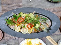 香柠酸辣明炉海鲈鱼-喜洲吧·江畔老船厂·庭院餐厅(喜临院店)