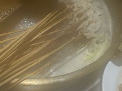 -明何记涮牛肚(品牌首店隋唐植物园南门古城路店)