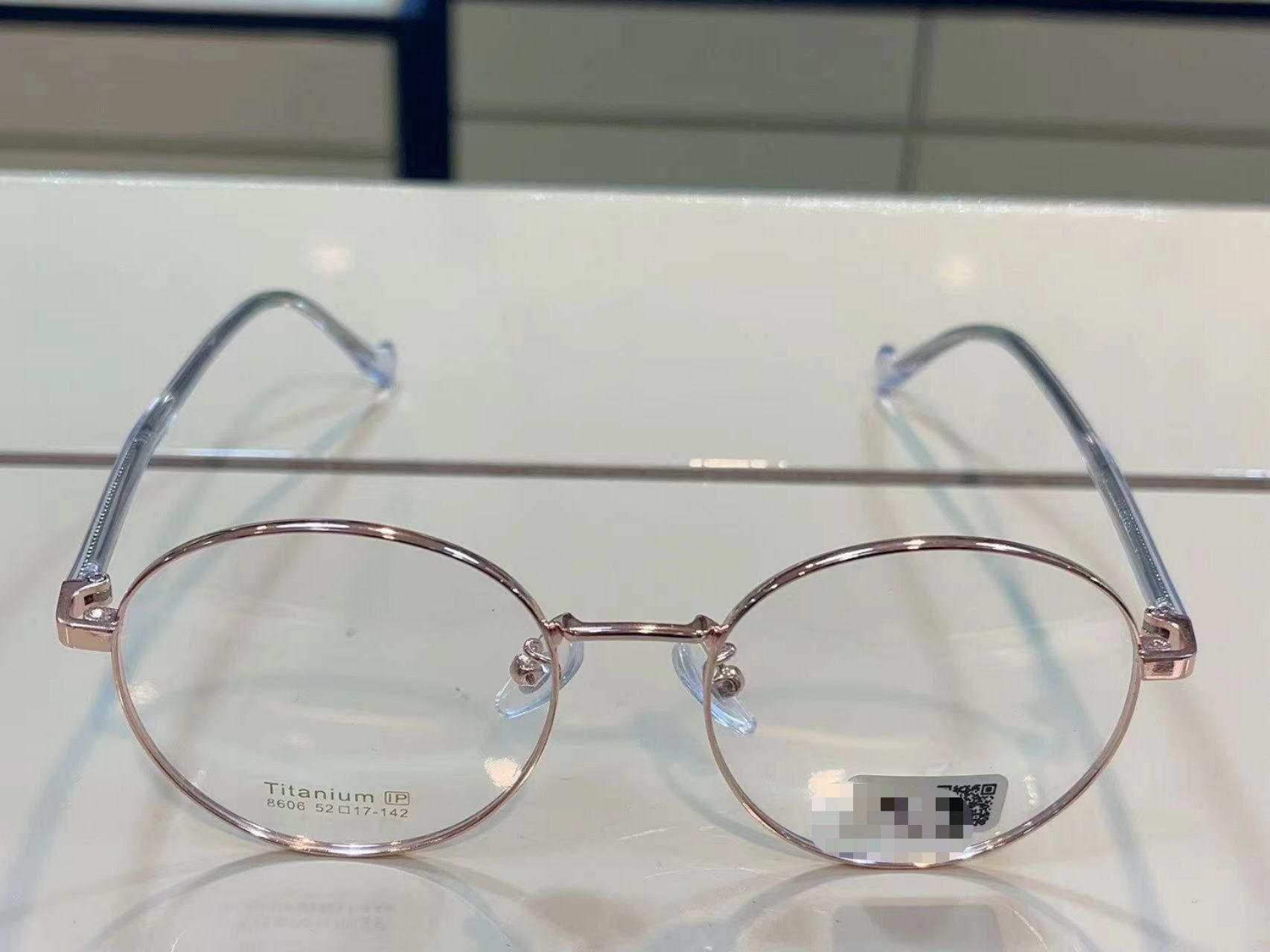 玫瑰金圆框眼镜