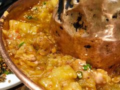 土司铜锅油焖鸡-浩海火烧云傣家菜(京广店)