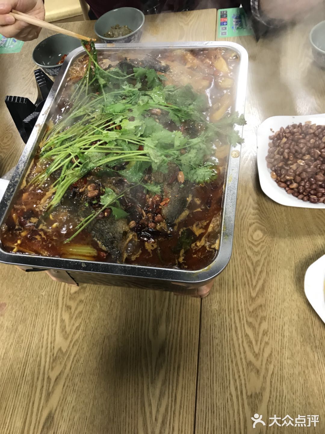 烤鱼相貌很不错，吃起来辣和爽口的鱼肉