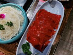 -老牌坊云南鱼豆花火锅(哈西万达店)