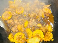 铁锅炖小鸡-冰城焰会大丰收铁锅炖(萝岗万达金街店)