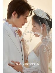 -雪中彩影婚纱摄影·微光艺术中心