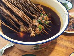 -拈签一笑黄牛肉辣卤串串