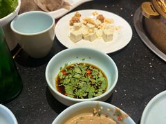 -明何记涮牛肚(品牌首店隋唐植物园南门古城路店)