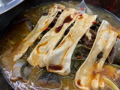 粘卷子-屯老二农家铁锅炖·行业领军者(梅江店)