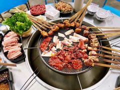 -彝人部落火盆烧烤(原内环足球场店)