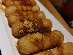 -明何记涮牛肚(品牌首店隋唐植物园南门古城路店)