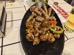 -喜悦小串丹东小黄牛海鲜烧烤大排档(民主广场店)