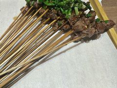 一口牛-街角等你.大连海鲜烧烤.经典铁板海鲜串(西安路店)