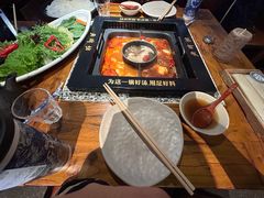 -老牌坊云南鱼豆花火锅(哈西万达店)