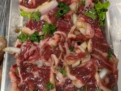 -喜悦小串丹东小黄牛海鲜烧烤大排档(民主广场店)