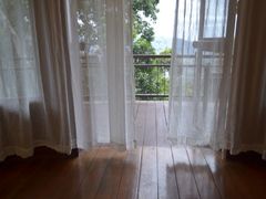 房内看阳台-三亚亚龙湾人间天堂鸟巢度假村