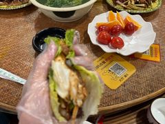 -沐毫傣泐云南菜孔雀宴•手抓饭傣味烧烤(曼听公园店)