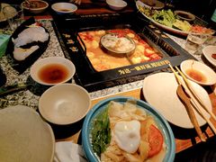 -老牌坊云南鱼豆花火锅(哈西万达店)