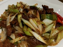 葱爆羊羔肉-巴扎美食·新疆菜·西域歌舞表演餐厅(新疆大厦店)
