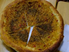 隔壁店的蒜蓉烤馕-清真·马峰烤肉(小学习北巷店)