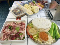-喜悦小串丹东小黄牛海鲜烧烤大排档(民主广场店)