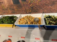 -明何记涮牛肚(品牌首店隋唐植物园南门古城路店)