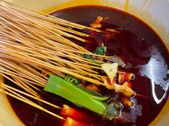 -拈签一笑黄牛肉辣卤串串