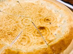 馕坑芝麻馕-巴扎美食·新疆菜·西域歌舞表演餐厅(新疆大厦店)