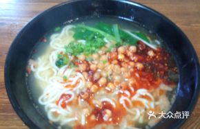 Spicy Broad Noodles with Pea and Meat Sauce